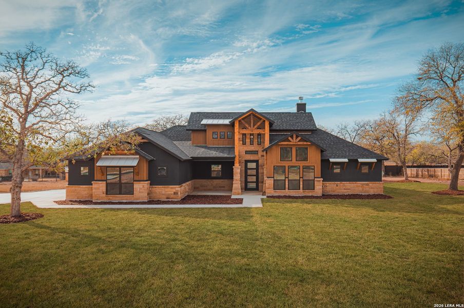 Front exterior of a new home in , Adkins, TX, highlighting curb appeal (Image 24). Front exterior of a new home in , Adkins, TX, highlighting curb appeal (Image 24).