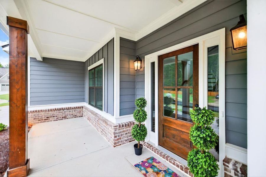Front exterior of a new home in Spring Creek, Monroe, GA, highlighting curb appeal (Image 22).