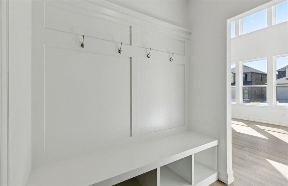 Shoe & bag storage upon entry Shoe & bag storage upon entry