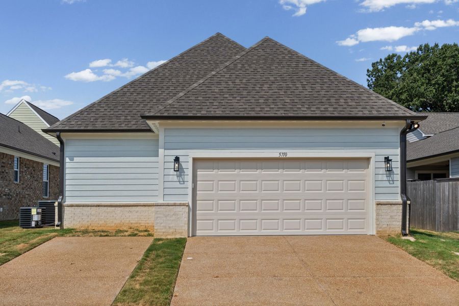 Front exterior of a new home in Myers Park, Arlington, TN, highlighting curb appeal (Image 17). Front exterior of a new home in Myers Park, Arlington, TN, highlighting curb appeal (Image 17).