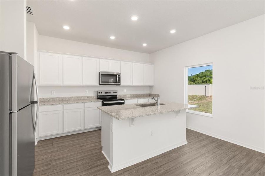 Furnished interior view inside a new home in Peach Crossings, Winter Haven (Image 7).