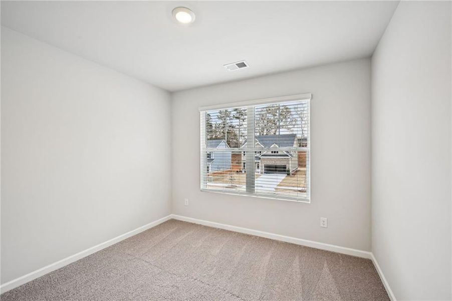 Spacious, unfurnished interior of a new home in The Hills at Cedar Creek, Winder (Image 44).