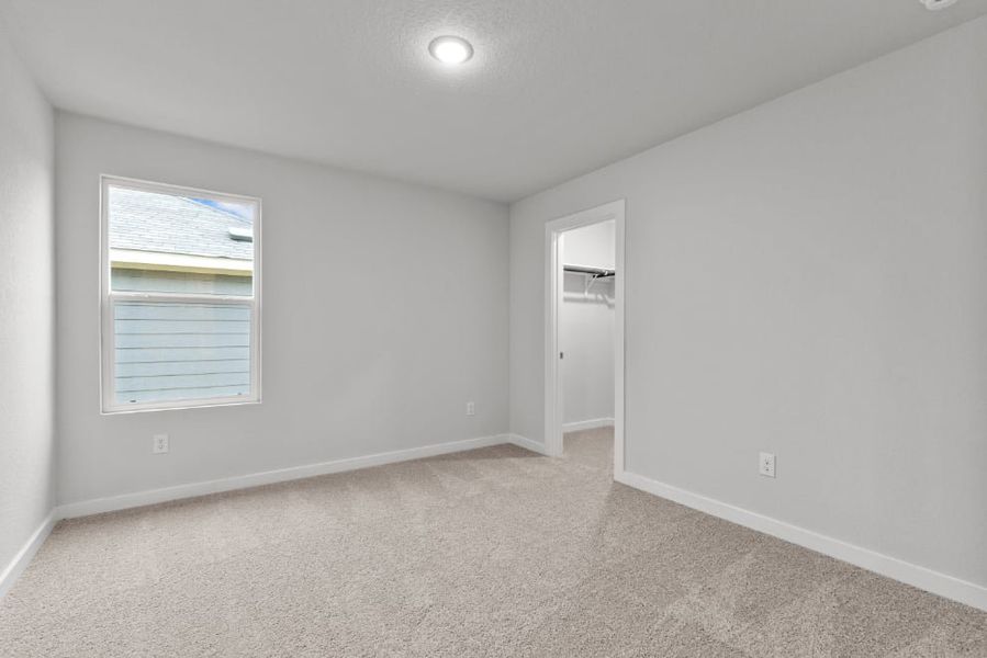 A room with a door and a window. A room with a door and a window.