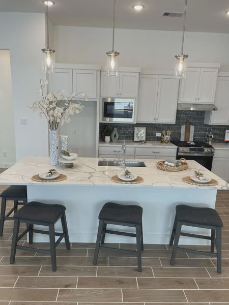 Representative furnished interior of a home built from the Mickelson by Chesmar Homes in Riceland Alley Loads, Mont Belvieu (Image 50).