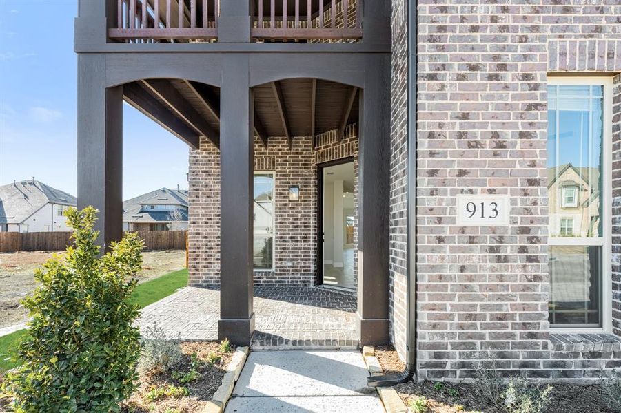 Exterior details and patio area of a home in West Crossing, Anna (Image 4).