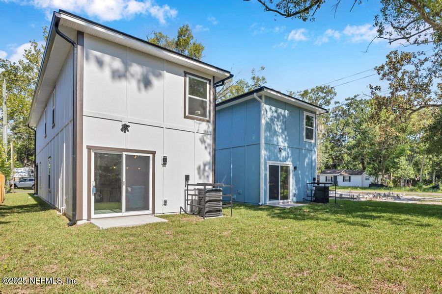 Front exterior of a new home in , Jacksonville, FL, highlighting curb appeal (Image 2).