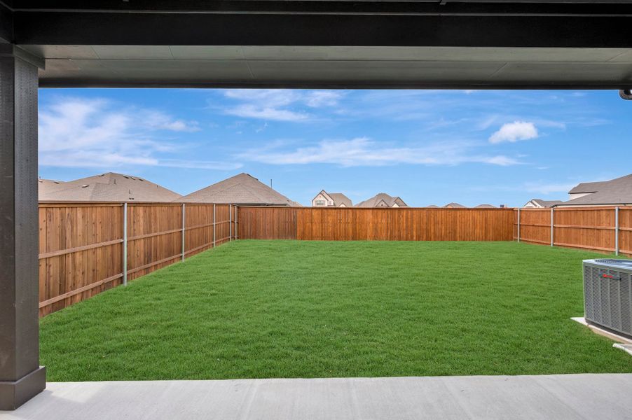 Exterior details and patio area of a home in Creekshaw – Classic, Royse City (Image 3).