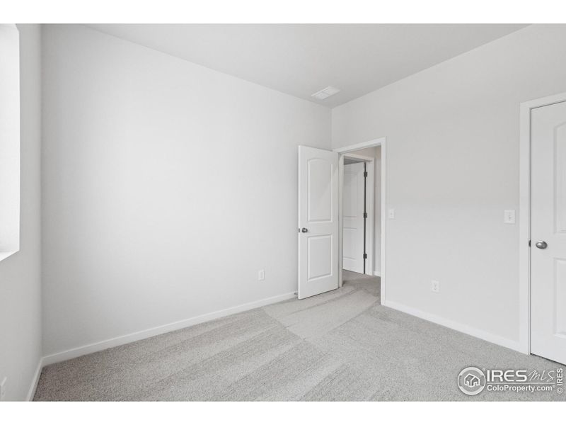 Spacious, unfurnished interior of a new home in Kinston Mainstreet Townhomes, Loveland (Image 20). Spacious, unfurnished interior of a new home in Kinston Mainstreet Townhomes, Loveland (Image 20).