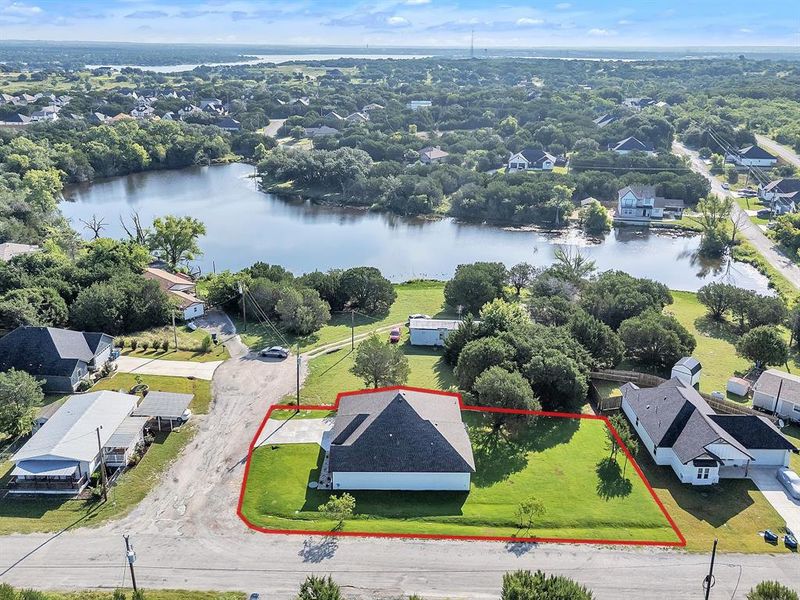 Front exterior of a new home in , Granbury, TX, highlighting curb appeal (Image 26). Front exterior of a new home in , Granbury, TX, highlighting curb appeal (Image 26).