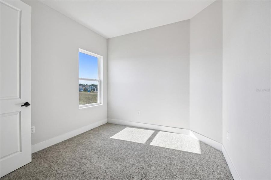 Spacious, unfurnished interior of a new home in Waterset Tradition Series, Apollo Beach (Image 31).