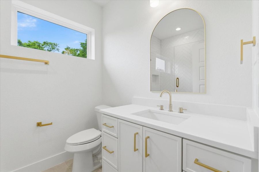 One of two full bathrooms located on the second floor.