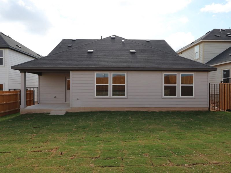 Exterior details and patio area of a home in Cascades at Onion Creek, Austin (Image 4).