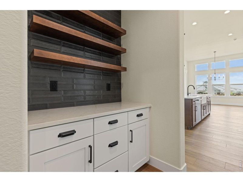 Furnished interior view inside a new home in RainDance, Windsor (Image 7).