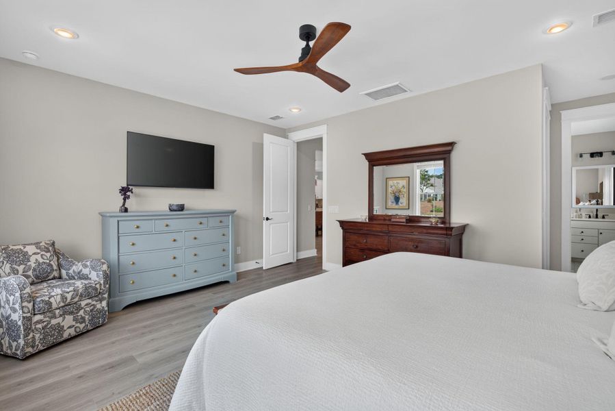 Furnished interior view inside a new home in K. Hovnanian's® Four Seasons at Lakes of Cane Bay, Summerville (Image 9).