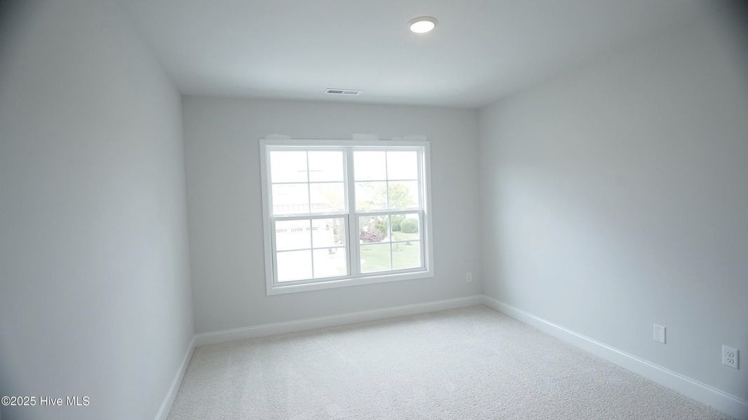 Spacious, unfurnished interior of a new home in Palmetto Creek, Bolivia (Image 29).