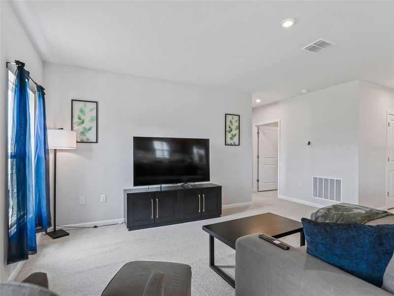 Furnished interior view inside a new home in , Sumterville (Image 35).