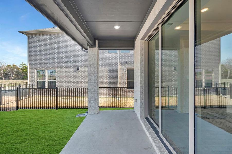 Exterior details and patio area of a home in Gateway Parks, Forney (Image 22).