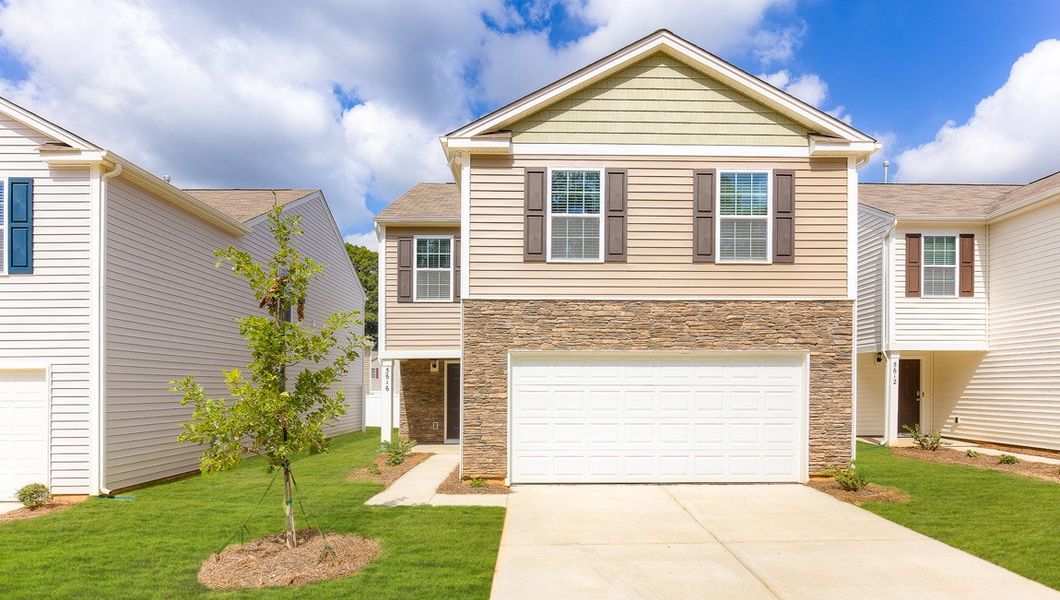 Front exterior of a new home in Zion Springs, Hickory, NC, highlighting curb appeal (Image 1). Front exterior of a new home in Zion Springs, Hickory, NC, highlighting curb appeal (Image 1).