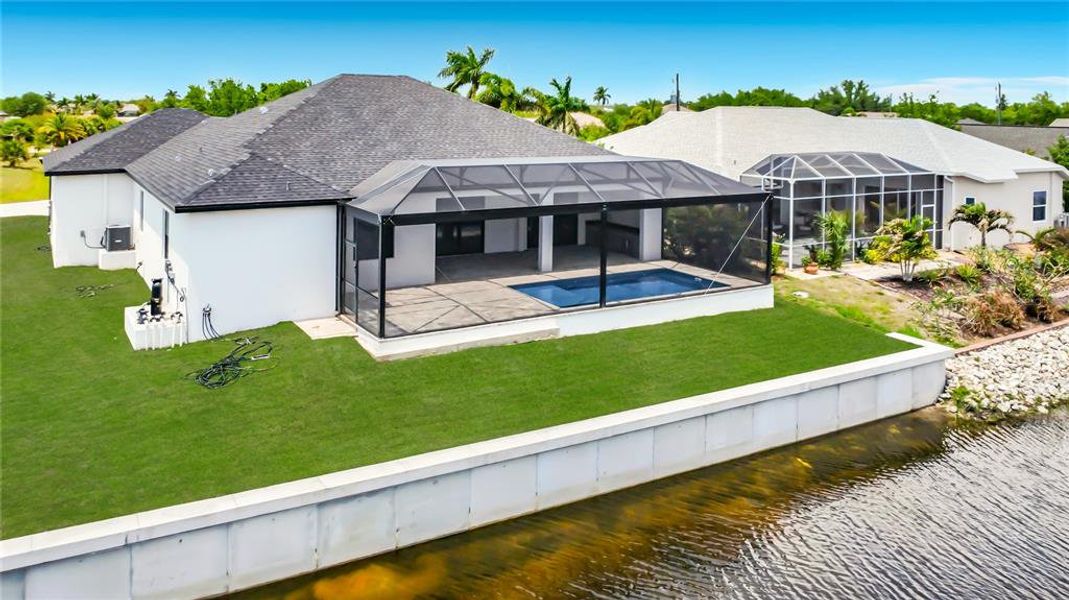 Exterior details and patio area of a home in , Port Charlotte (Image 36).
