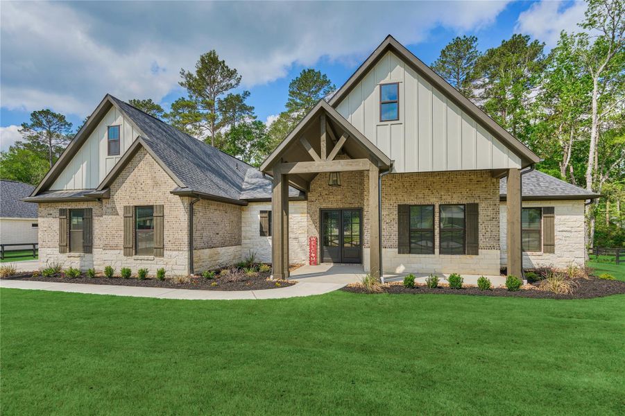 Front exterior of a new home in , Montgomery, TX, highlighting curb appeal (Image 2).