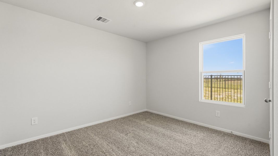 Spacious, unfurnished interior of a new home in Sunterra, Katy (Image 21).