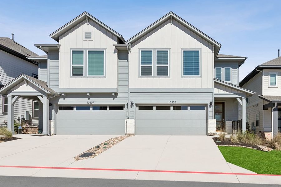 Front exterior of a new home in Easton Park - Nelson Village - Jewel Series, Austin, TX, highlighting curb appeal (Image 1). Front exterior of a new home in Easton Park - Nelson Village - Jewel Series, Austin, TX, highlighting curb appeal (Image 1).