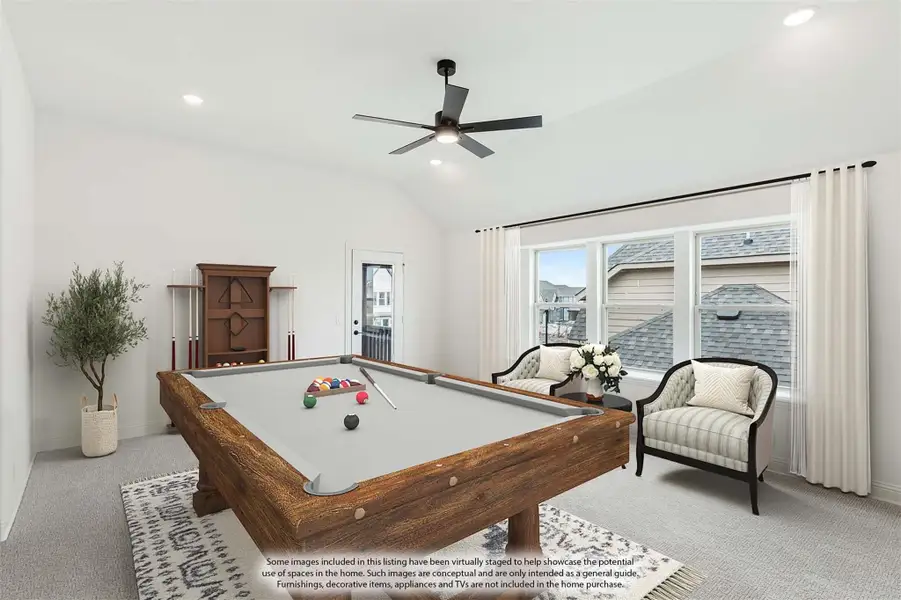 Game room with wood pool table, ceiling fan, vaulted ceiling, and seating area near large windows
