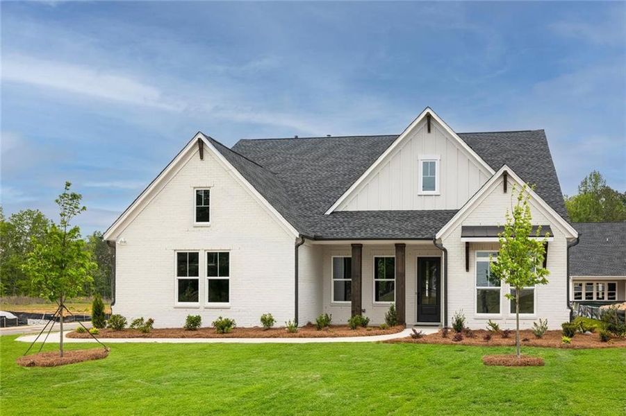 Front exterior of a new home in , Cumming, GA, highlighting curb appeal (Image 1). Front exterior of a new home in , Cumming, GA, highlighting curb appeal (Image 1).