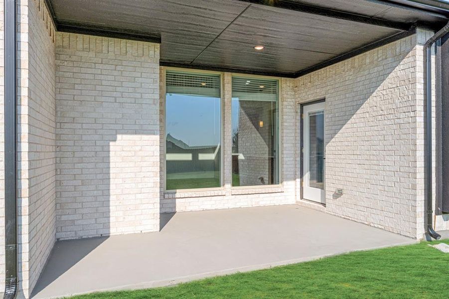 Front exterior of a new home in Wildflower Ranch 60-65, Fort Worth, TX, highlighting curb appeal (Image 24). Front exterior of a new home in Wildflower Ranch 60-65, Fort Worth, TX, highlighting curb appeal (Image 24).