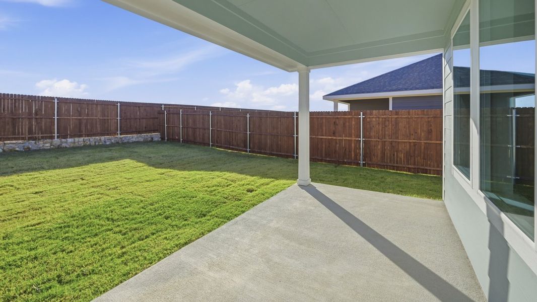 Exterior details and patio area of a home in Windrose, Pilot Point (Image 3).