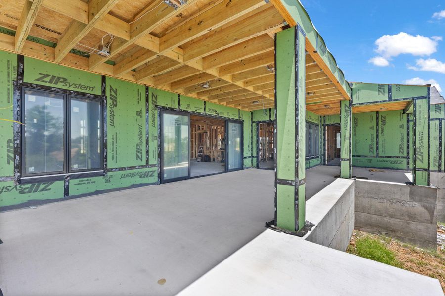 A spacious, newly constructed patio provides ample outdoor living space, ready for your personalized touches. A spacious, newly constructed patio provides ample outdoor living space, ready for your personalized touches.