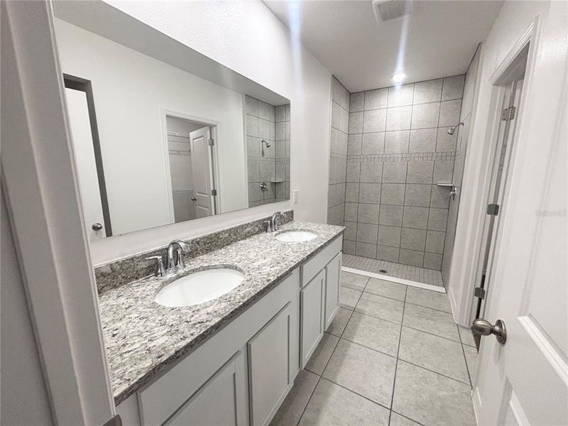 Furnished interior view inside a new home in Lake Deer Estates, Poinciana (Image 7).