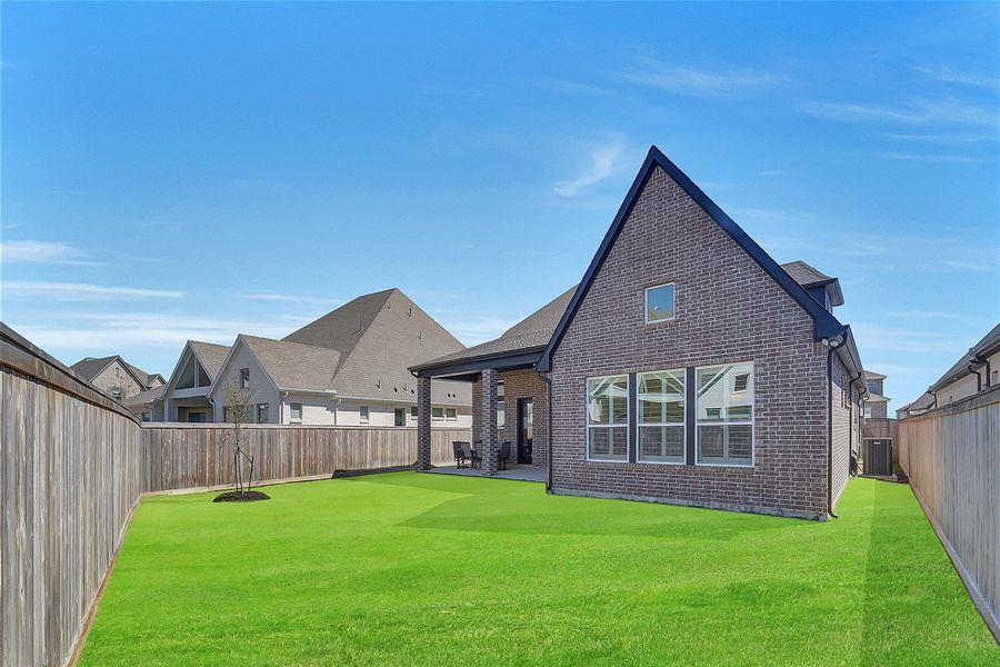 Exterior details and patio area of a home in , Cypress (Image 3).