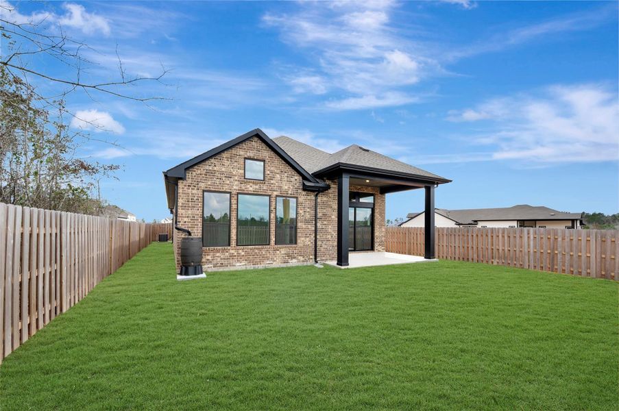 Exterior details and patio area of a home in COLTON - Reserve Collection, Todd Mission (Image 29).