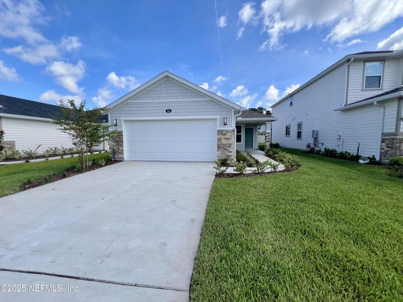 Front exterior of a home in the Stonecrest community, located in St. Johns, FL (Image 4).