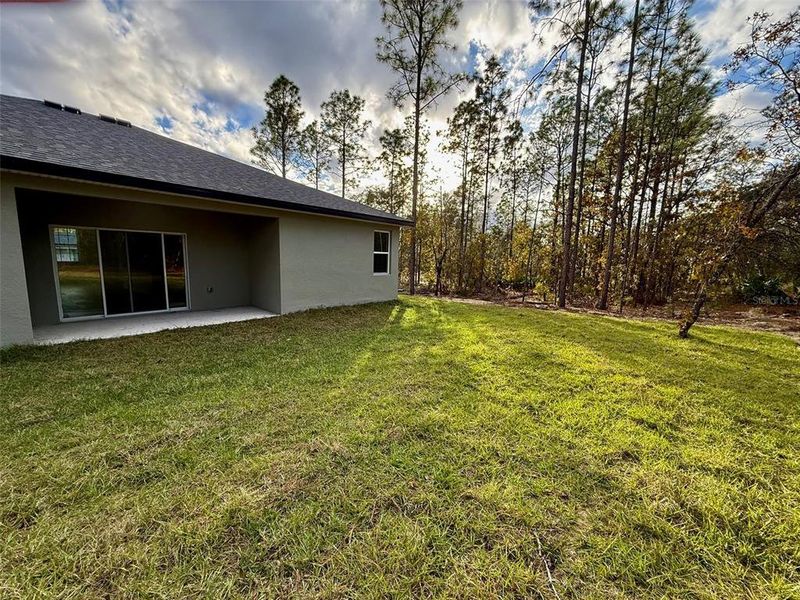 Exterior details and patio area of a home in , Citrus Springs (Image 37).