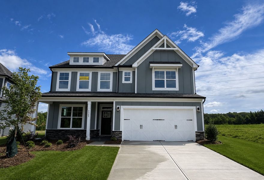 Front exterior of a new home in The Enclave at Laurelbrook, Sherrills Ford, NC, highlighting curb appeal (Image 1). Front exterior of a new home in The Enclave at Laurelbrook, Sherrills Ford, NC, highlighting curb appeal (Image 1).