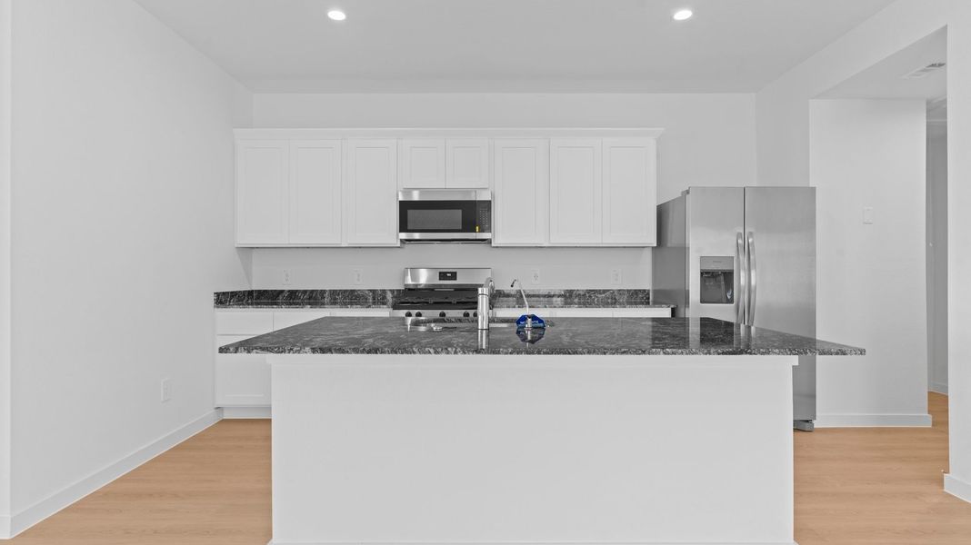 Furnished interior view inside a new home in Caldwell Crossing, Iowa Colony (Image 5). Furnished interior view inside a new home in Caldwell Crossing, Iowa Colony (Image 5).