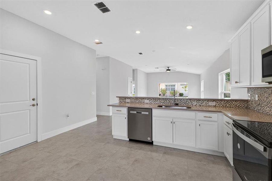 Furnished interior view inside a new home in , Port Charlotte (Image 9).