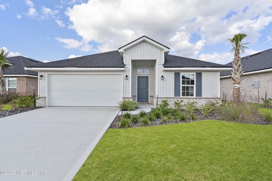 Front exterior of a new home in Shadow Crest at Rolling Hills, Green Cove Springs, FL, highlighting curb appeal (Image 15).