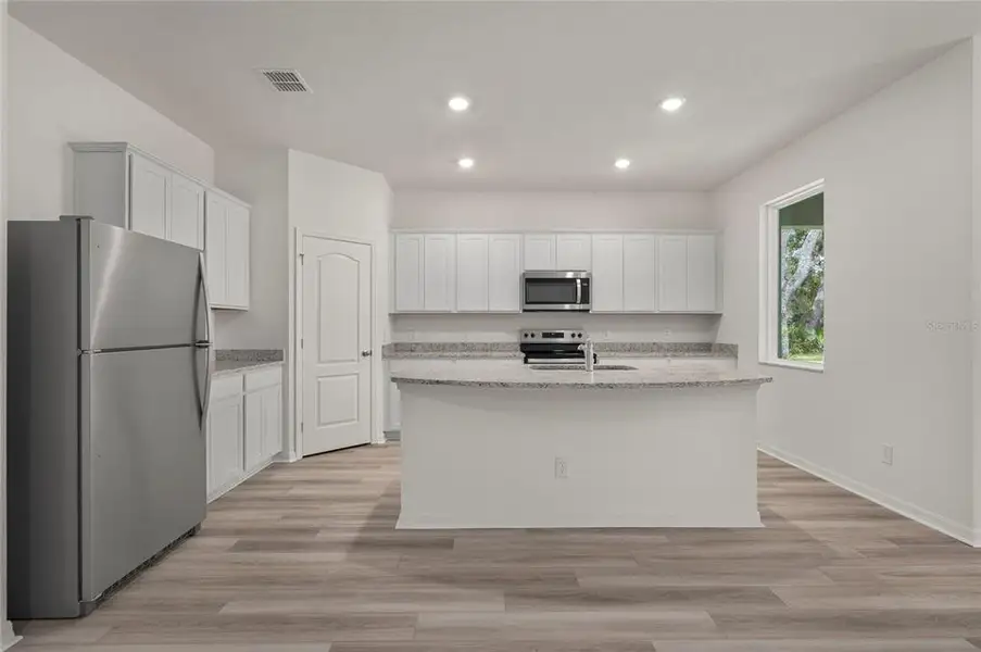Furnished interior view inside a new home in , Poinciana (Image 5).