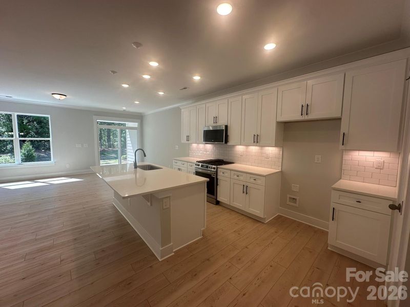 Furnished interior view inside a new home in Blythe Mill Townhomes, Waxhaw (Image 3).