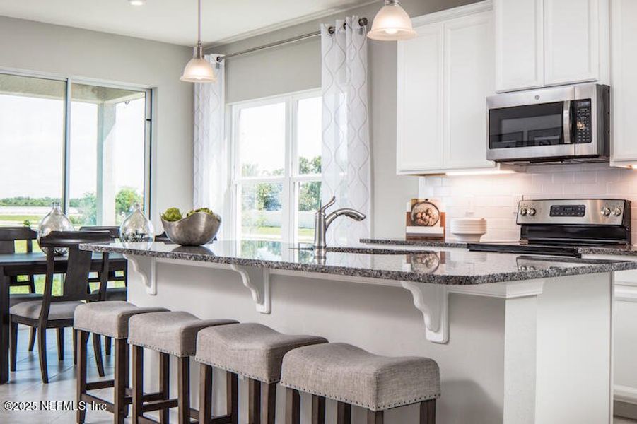 Furnished interior view inside a new home in Seminole Palms Single-Family Homes, Palm Coast (Image 2).