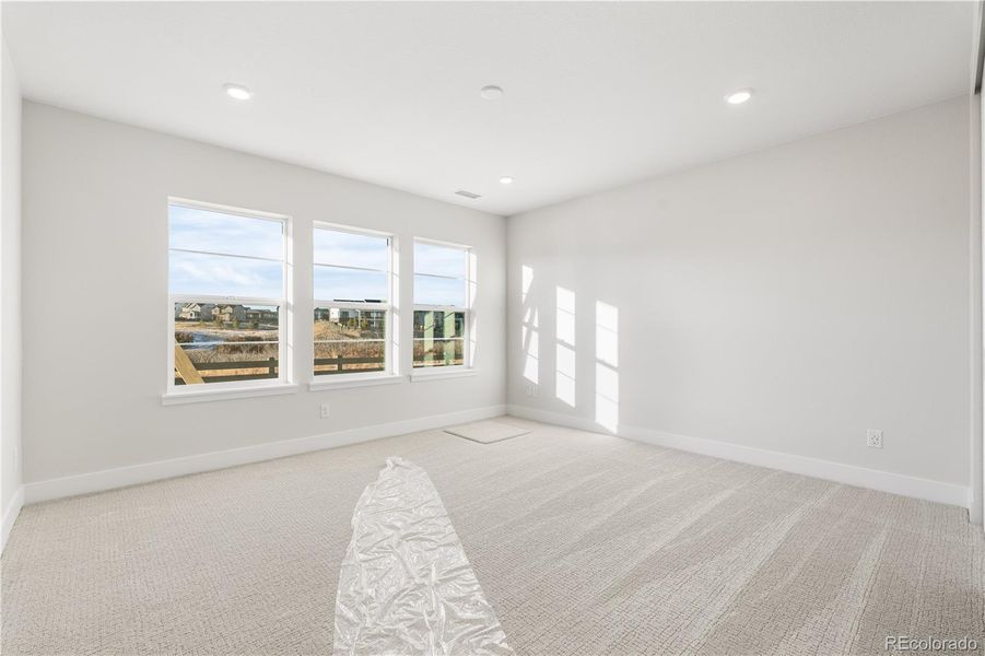 Spacious, unfurnished interior of a new home in Luxe at The Canyons, Castle Pines (Image 37).