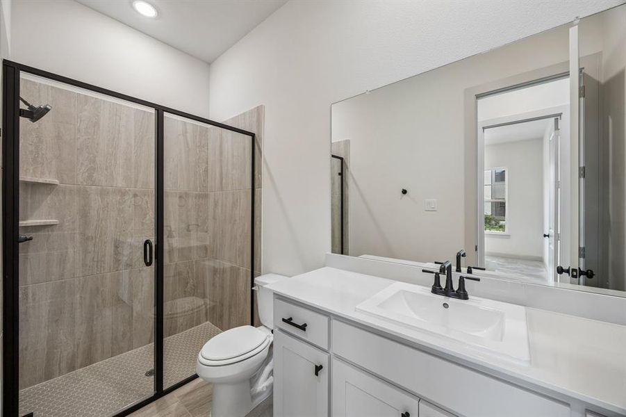 Friends and family will feel right at home in either of the beautifully finished guest baths.