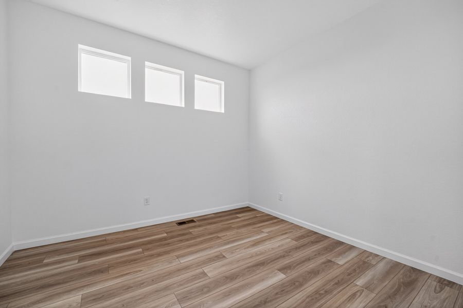 Spacious, unfurnished interior of a new home in Sky Ranch, Watkins (Image 12).