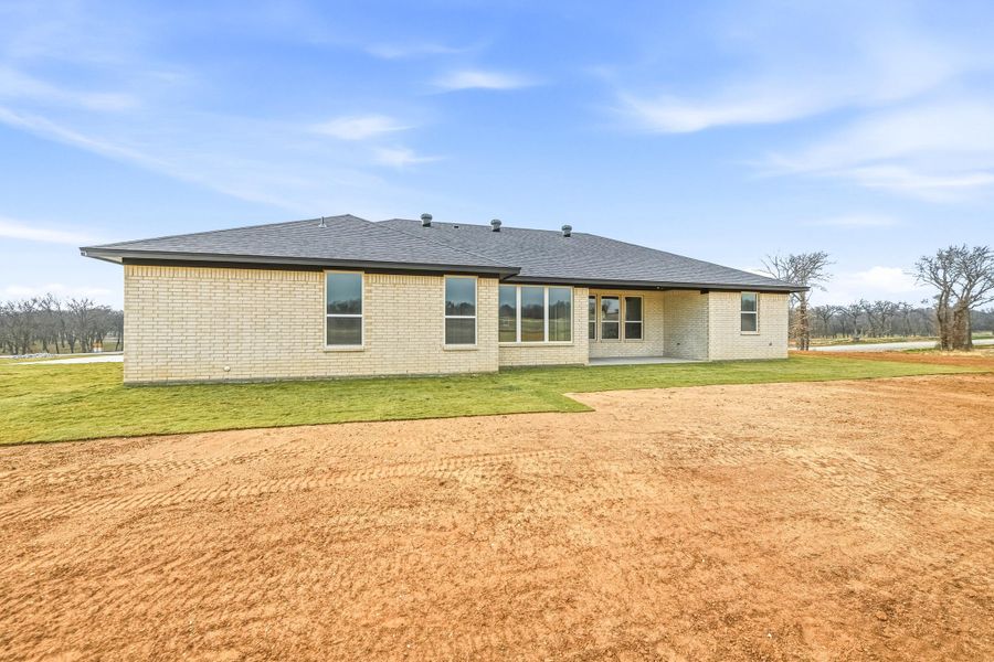 Exterior details and patio area of a home in Taylor Ranch, Springtown (Image 25).