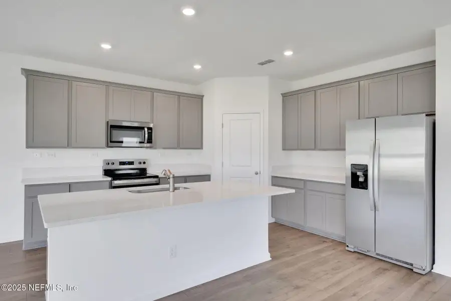 Furnished interior view inside a new home in Amberly, Green Cove Springs (Image 4).