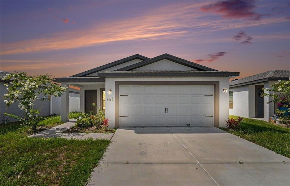 Front exterior of a new home in , Tampa, FL, highlighting curb appeal (Image 1). Front exterior of a new home in , Tampa, FL, highlighting curb appeal (Image 1).