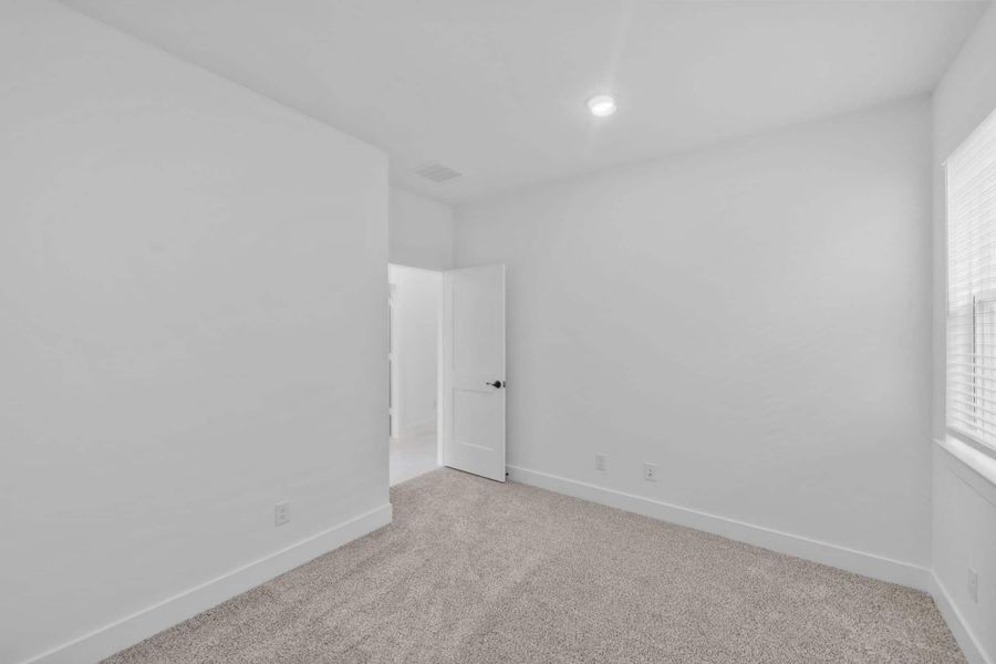 Spacious, unfurnished interior of a new home in Bridgeland, Cypress (Image 28). Spacious, unfurnished interior of a new home in Bridgeland, Cypress (Image 28).